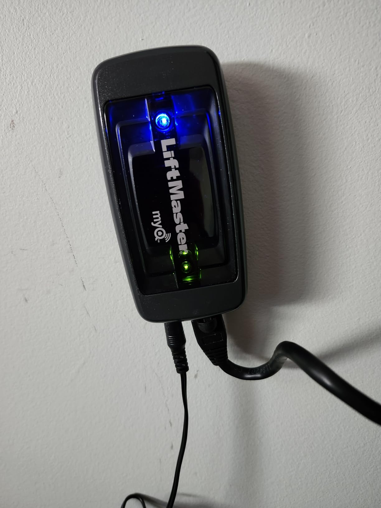 LiftMaster 828LM - Internet Gateway - Only Works with Security+ 2.0 Garage Door Openers - Smart Control for MyQ-Enabled Devices Including Gate Operators - Ethernet connectivity only, Black, Plastic customer photo 1