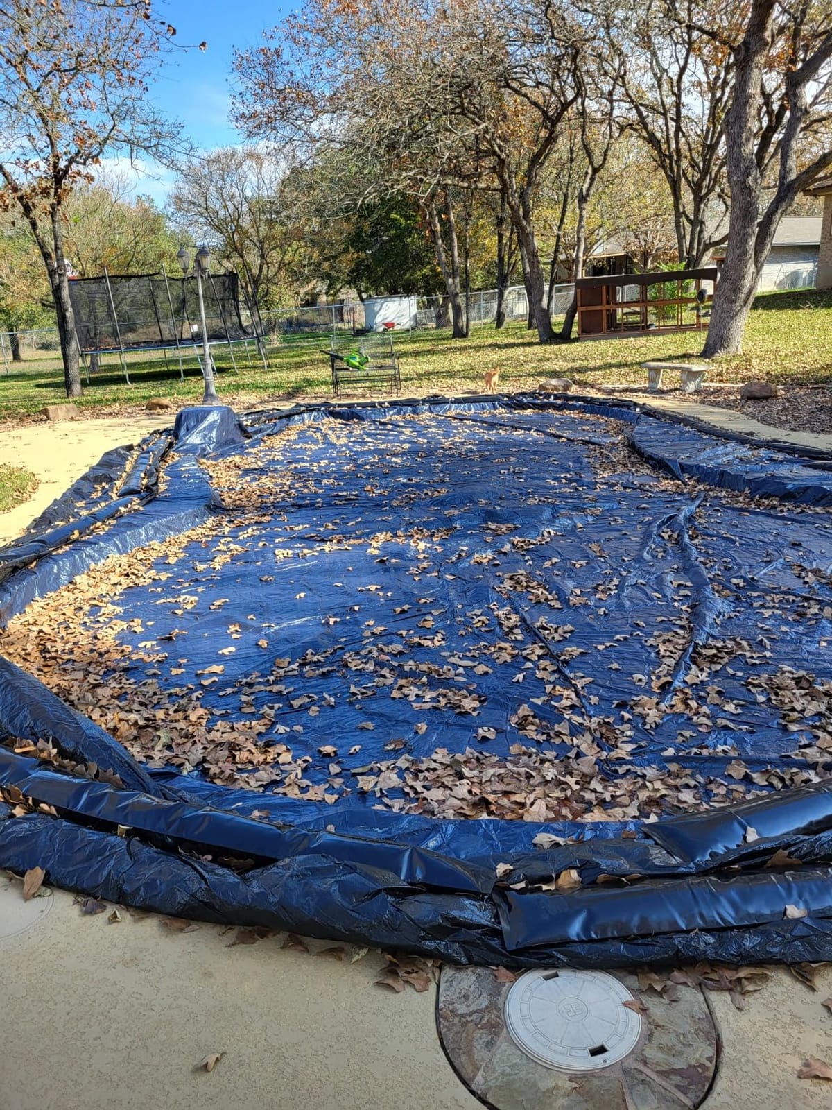 Blue Wave Arctic Armor 30x50-ft Rectangular In-Ground Pool Winter Cover | Solid polyethylene, black underside, heat-sealed seams, grommets, cable, winch, extra 5-ft overlap, 8-yr support, navy customer photo 1