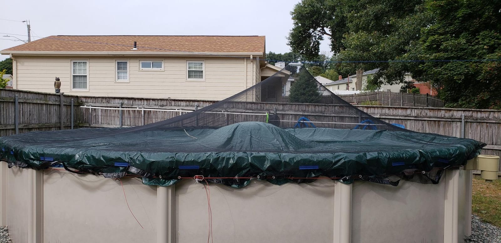 Blue Wave Arctic Armor 24-ft Round Leaf Net Mesh Above Ground Pool Cover | Treated polyethylene, extra 3-ft overlap, reinforced grommets every 2 ft, vinyl cable, metal winch, drains rain, traps leaves customer photo 1