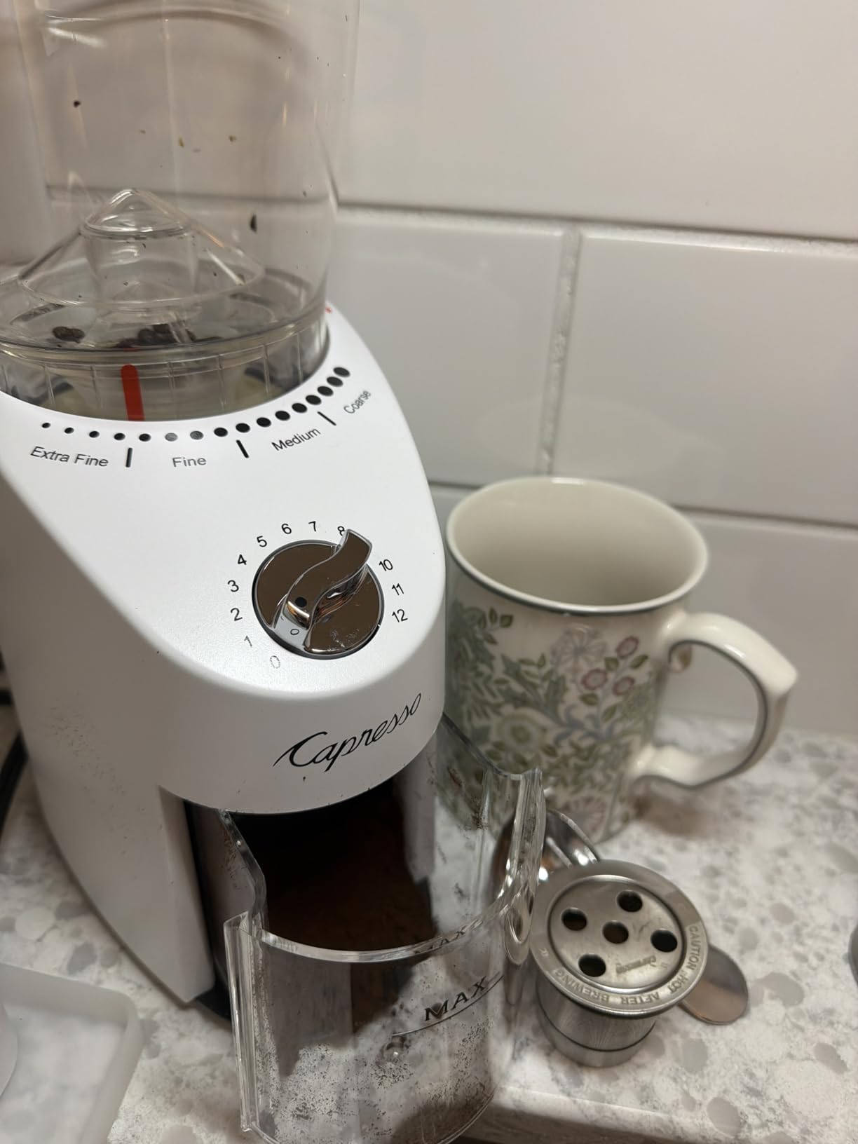 Capresso Infinity Plus Conical Burr Grinder, Black | Commercial-grade steel burrs, 16 settings, low-speed gear motor customer photo 1