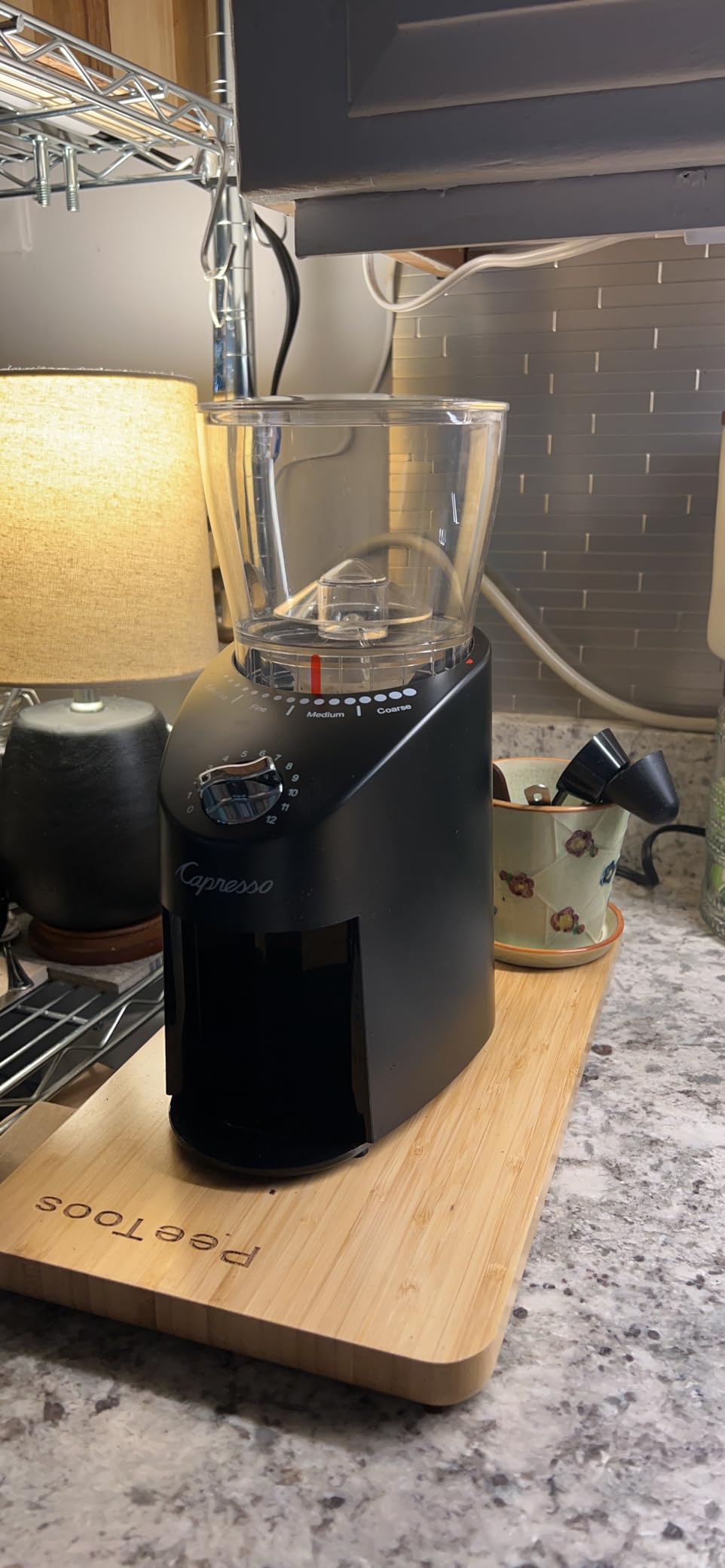 Capresso Infinity Plus Conical Burr Grinder, Black | Commercial-grade steel burrs, 16 settings, low-speed gear motor customer photo 2