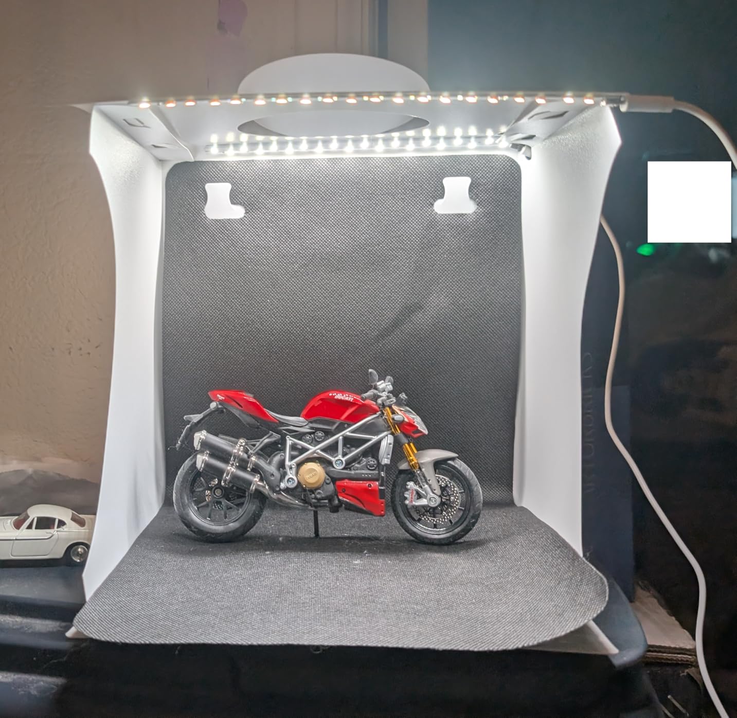 DUCLUS Mini Photo Studio Light Box, Portable Folding Photography Light Tent kit with 40pcs LED Light + 6 Kinds Color Backgrounds for Small Size Products customer photo 1