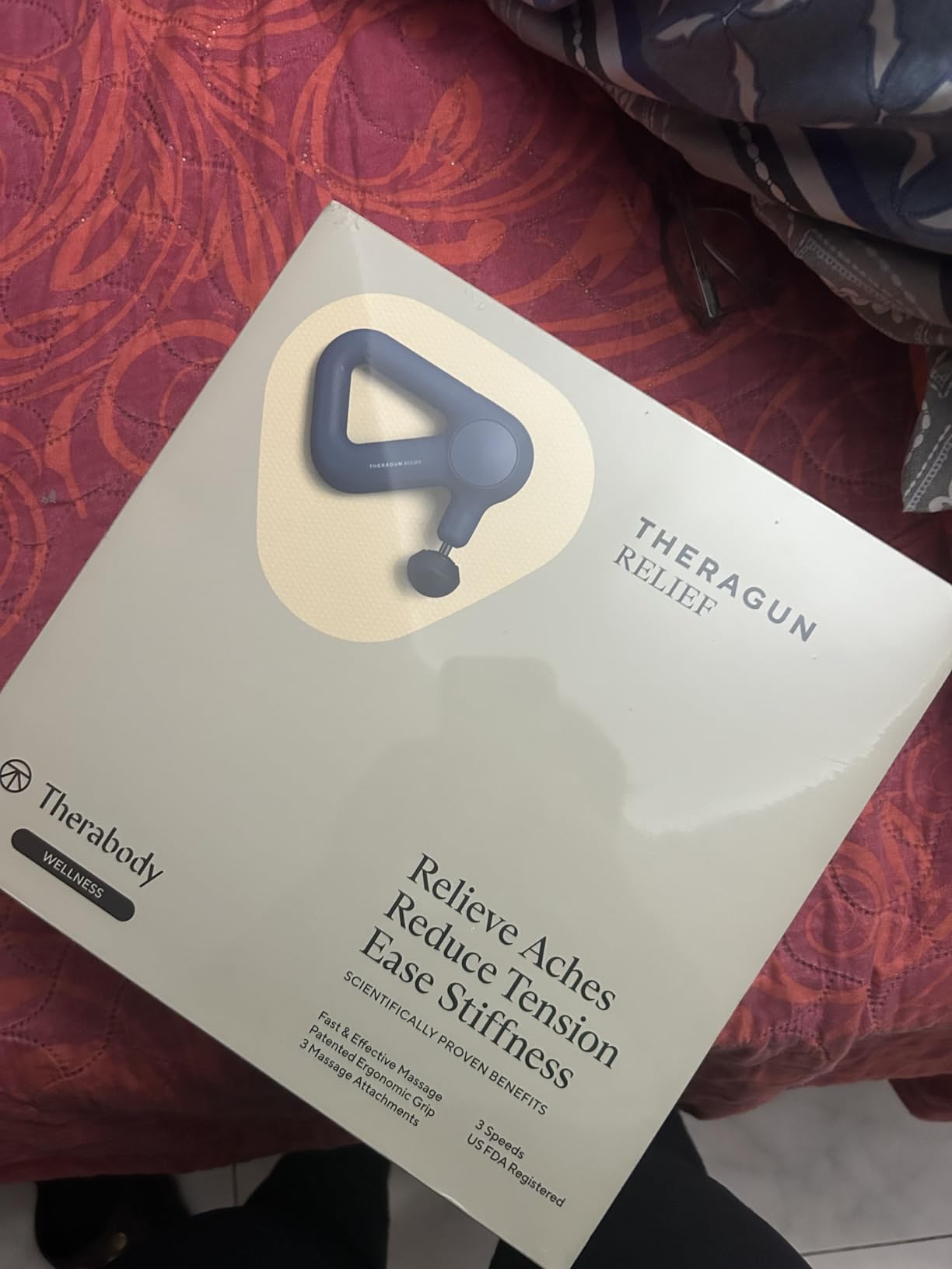 TheraGun Therabody Relief Massage Gun | for Daily Comfort | 3-Speed | Navy | Quiet Handheld Percussion Muscle Massager for Back, Leg & Shoulder Pain Relief. Lightweight, Easy to Use, Ergonomic Grip customer photo 2