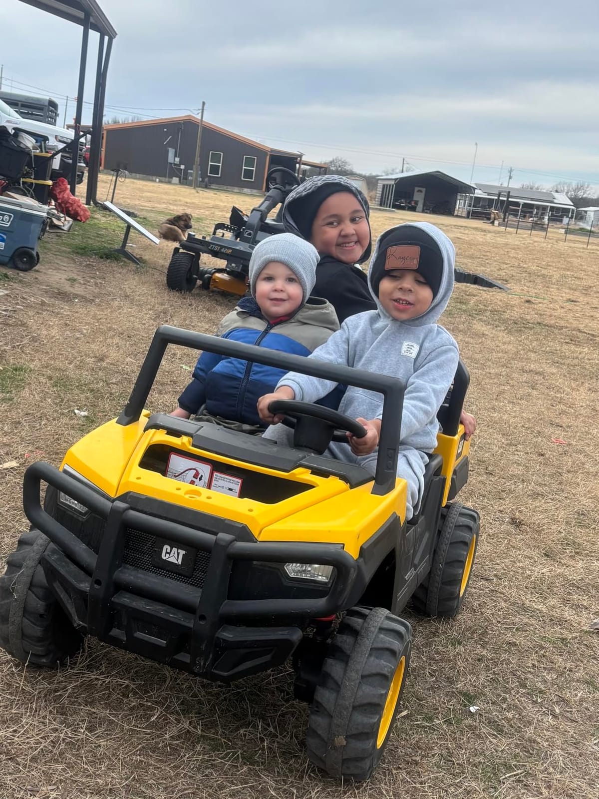 ANPABO Licensed Caterpillar 24V Ride On Toys with Dump Bed and Shovel | 2 Seater Ride On Dump Truck, Remote Control, 4x100W Motors, Up to 5mph, Rear Shock Absorbers, Bluetooth, Gift for Kids 3-6 customer photo 1