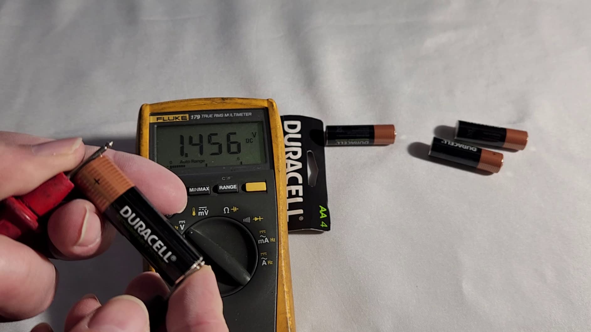 Duracell Rechargeable AA Batteries 4 Count, Long-lasting Power, All-Purpose Pre-Charged NiMH Double A Battery for Household and Gaming Devices customer photo 2