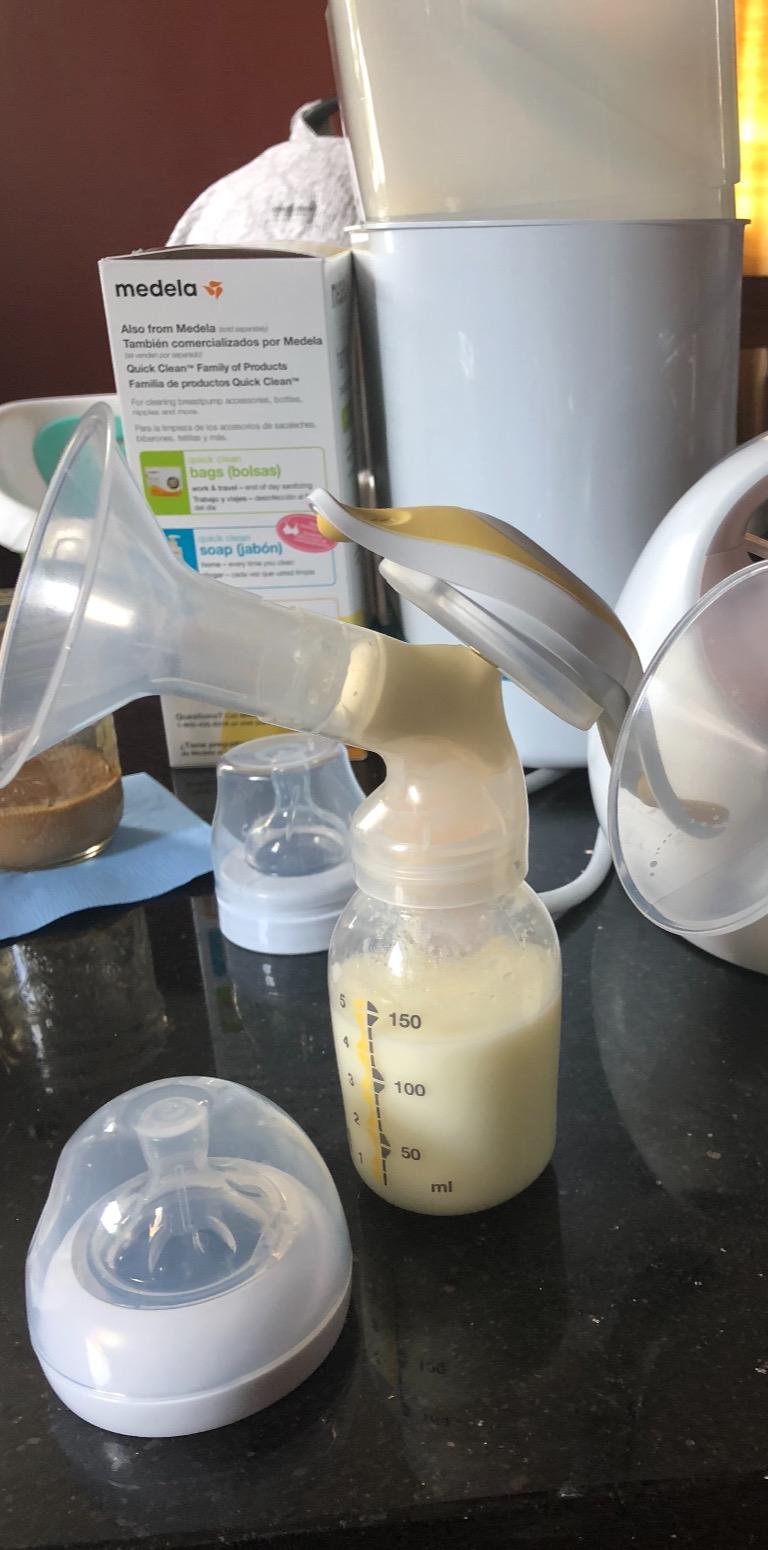 Medela, Harmony Breast Pump, Manual Breast Pump, Portable Pump, 2-Phase Expression Technology, Ergonomic Swivel Handle, Easy to Control Vaccuum, Designed for Occasional Use customer photo 1