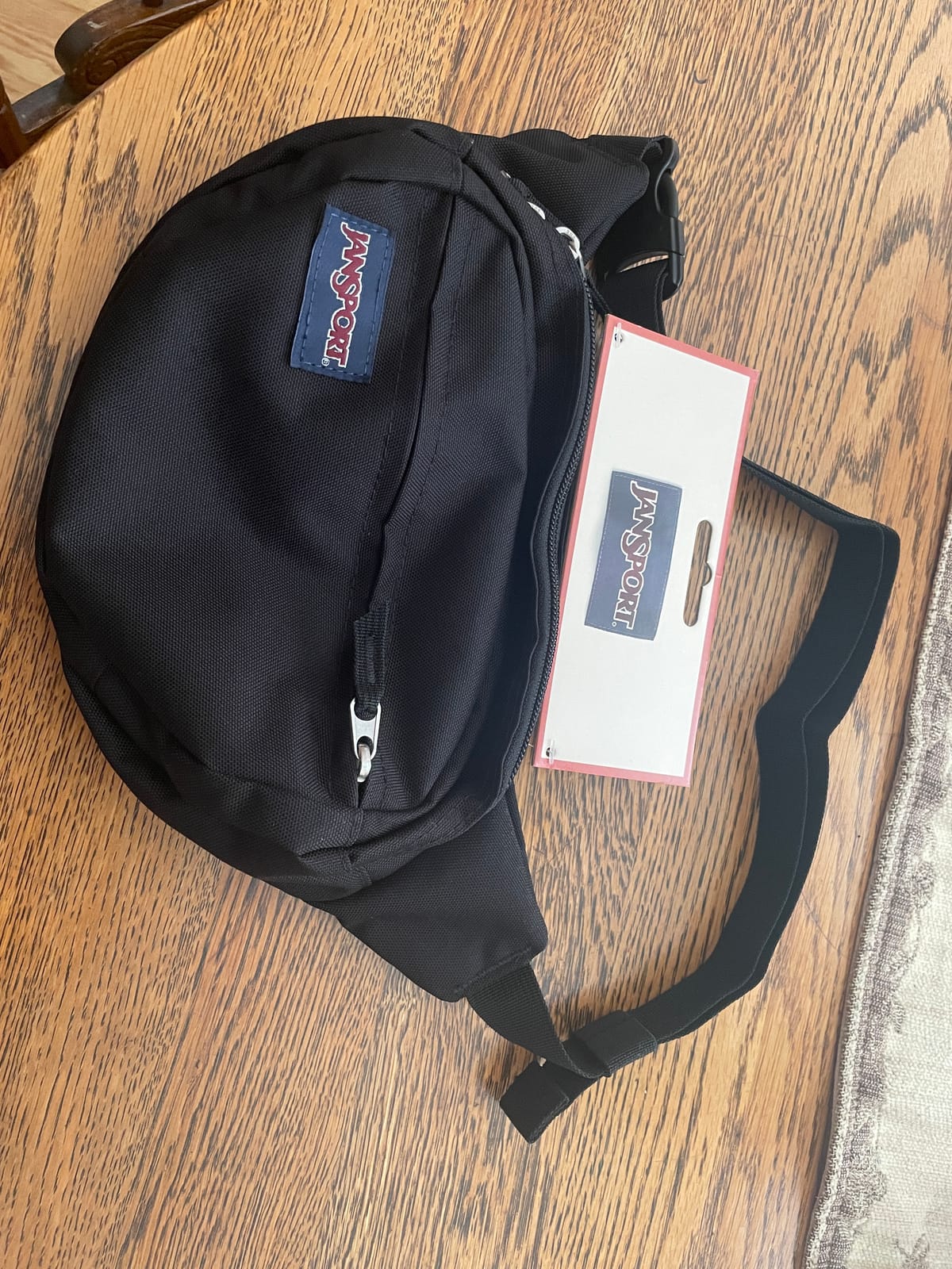 JanSport Fifth Avenue Fanny Pack Crossbody Bags for Women, Men - Stylish, Durable Waist Bag with Adjustable Belt, Main Zippered Pocket, Quick Stash Pocket, Travel Essentials, Black customer photo 1