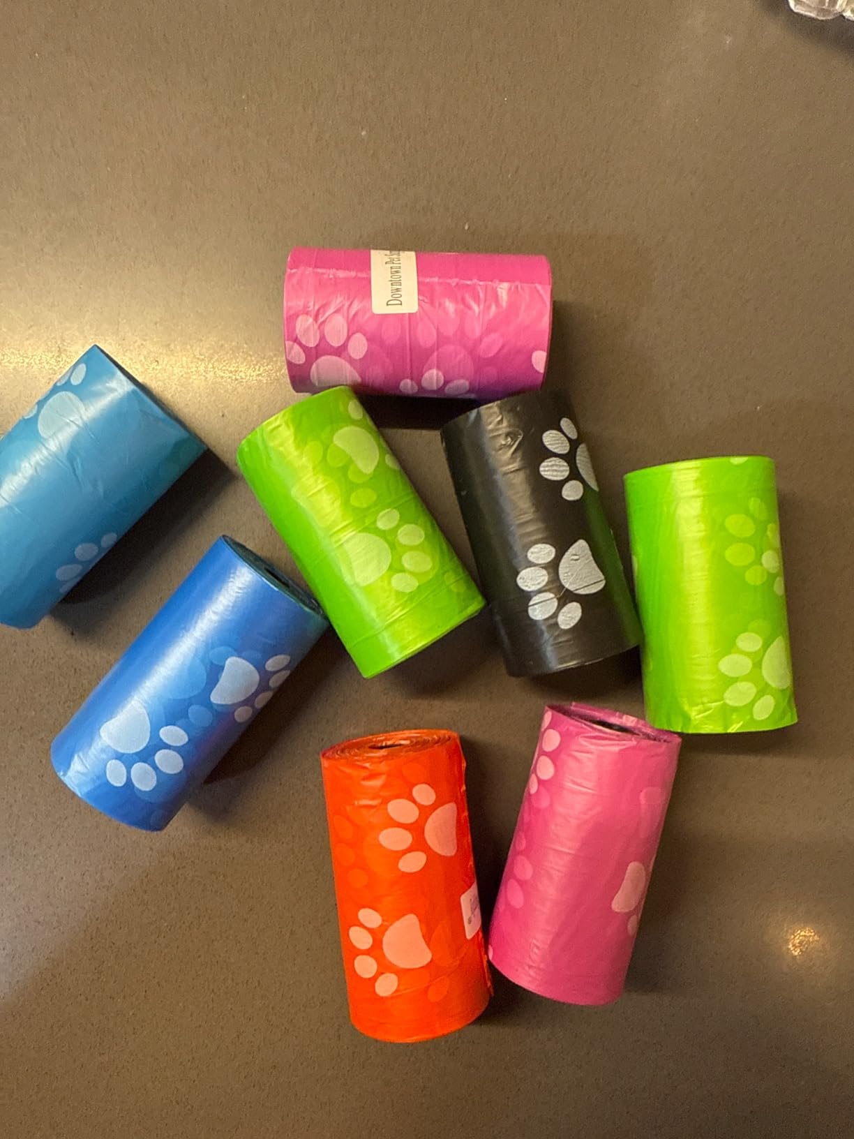 Downtown Pet Supply Poop Bags for Dogs with Dispenser, 1000 Count - Leak-Proof Dog Waste Bags and Bone-Shaped Dog Poop Bags Holder for Leash - Rainbow with Paw Prints, 12.5