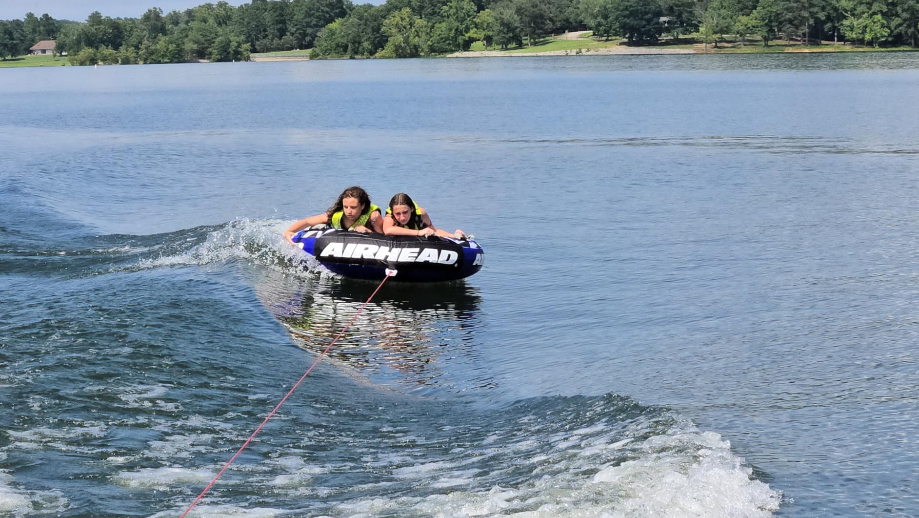 Airhead Slice Towable 2-4 Rider Models, Tube for Boating and Water Sports, Heavy Duty Full Nylon Cover with Zipper, EVA Foam Pads, and Patented Speed Safety Valve for Easy Inflating & Deflating customer photo 1
