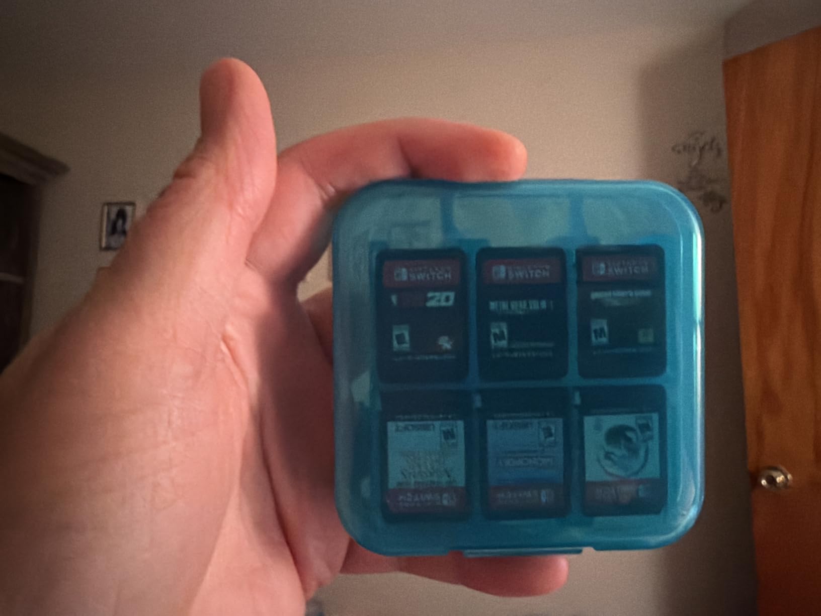 Amazon Basics Portable Game Storage Case for 24 Nintendo Switch Games, Game Card Slots, 3.4 x 3.4 x 1 Inches, Blue customer photo 1
