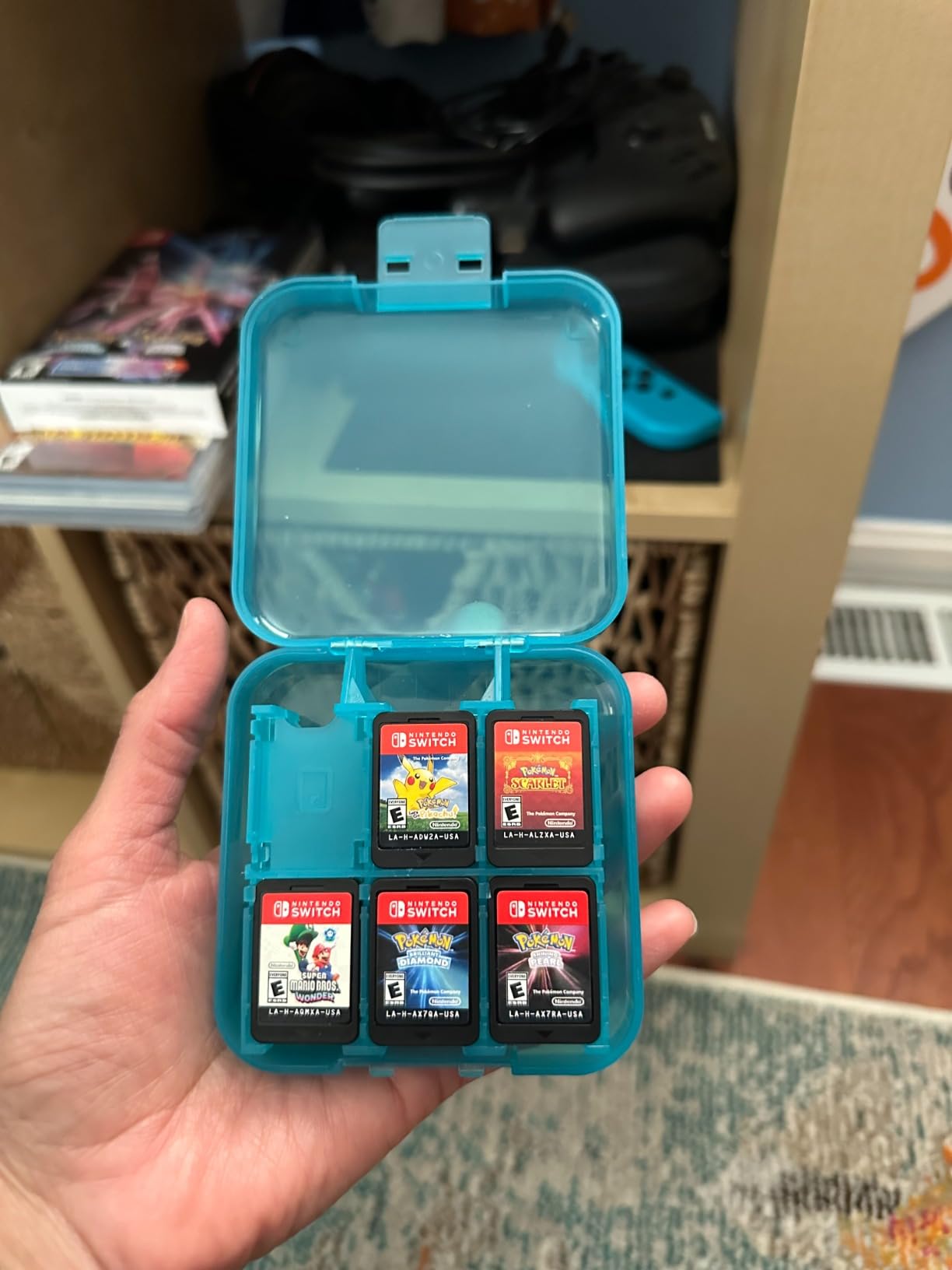 Amazon Basics Portable Game Storage Case for 24 Nintendo Switch Games, Game Card Slots, 3.4 x 3.4 x 1 Inches, Blue customer photo 2