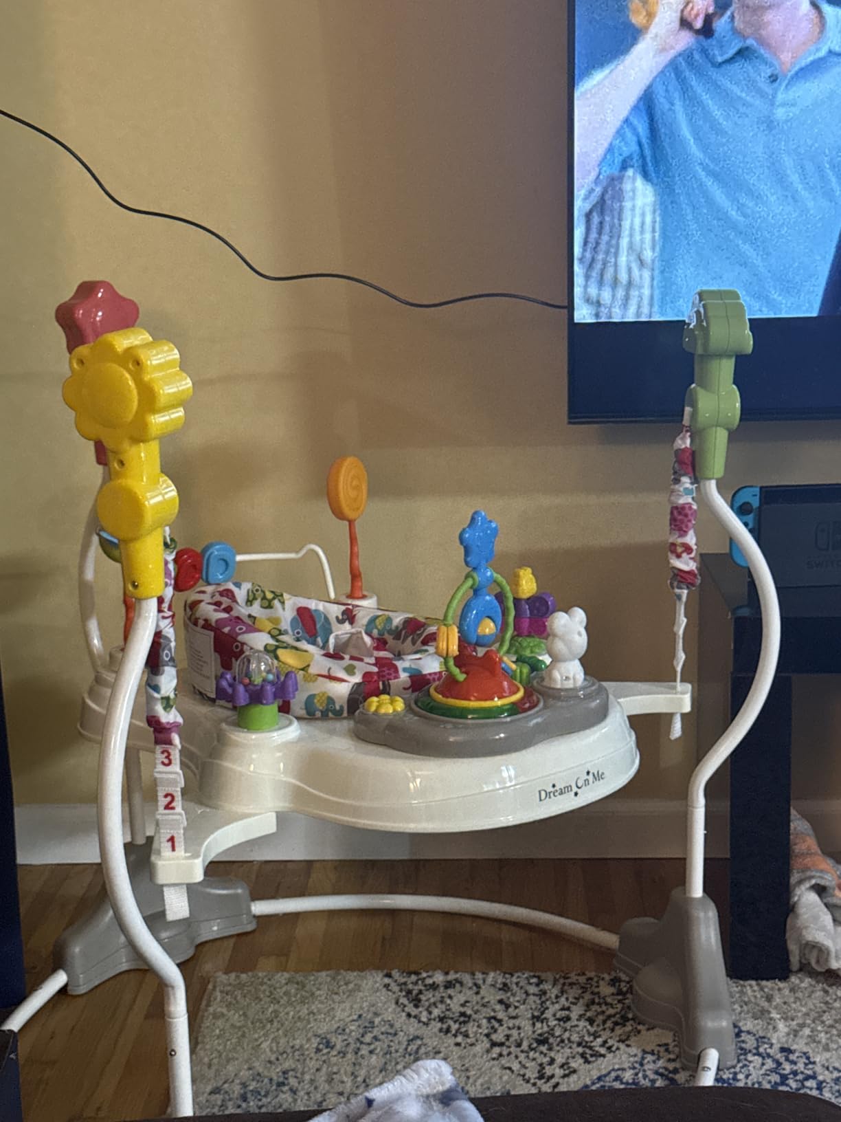 Dream On Me 2-in-1 Baby Activity Center & Bouncer Jumper, 360° Rotating Seat, 3-Height Adjustable, 12 Melodies with Lights & Interactive Toys, Promotes Early Development - Star Print customer photo 1
