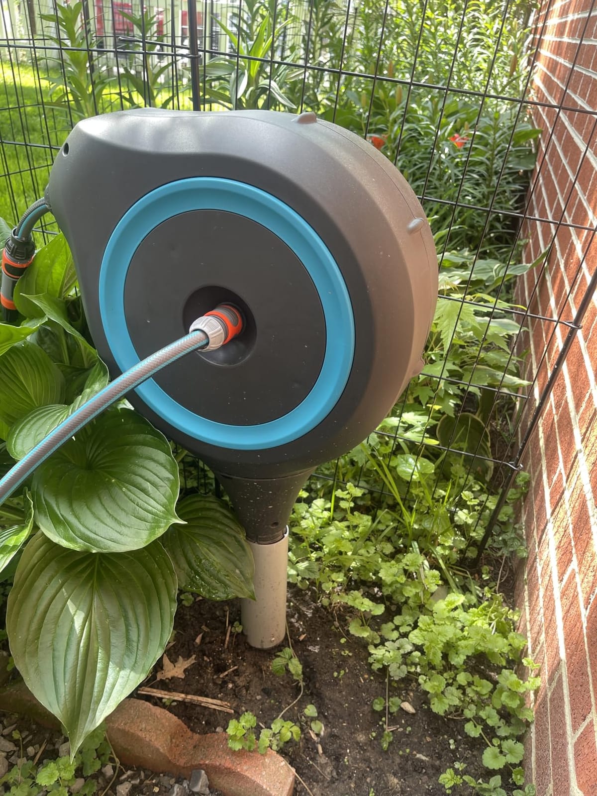 GARDENA Automatic Retractable Garden Hose Reel - 50 Feet - 360 Degree Swivel Outdoor Hose Reel with Metal Spike Base - Auto Retract - UV Resistant Housing - Easy Install No Tools Required - 18604 customer photo 2