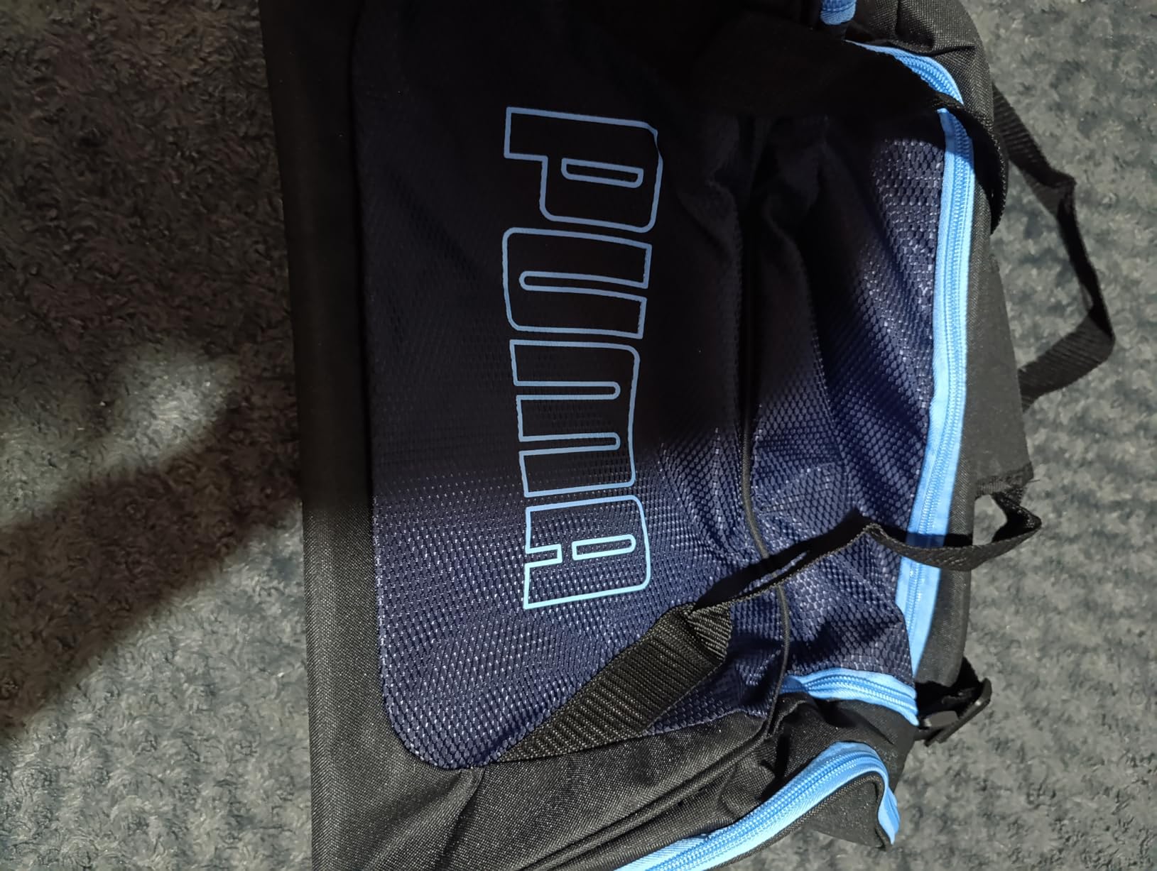 PUMA unisex-adult Form Factor Duffel with Adjustable Strap, Padded Bottom & Zip Pockets customer photo 1