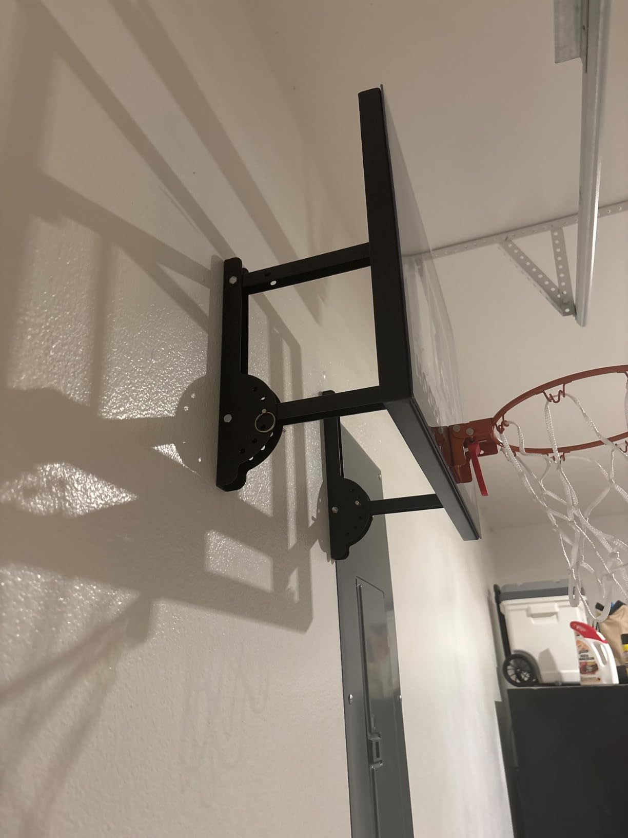 Franklin Sports Pro Hoops Adjustable Wall-Mounted Basketball Hoop - XL | Shatter-Resistant Backboard, Fold-Away Rim Saves Space, Steel Hardware + Anchors Included customer photo 2