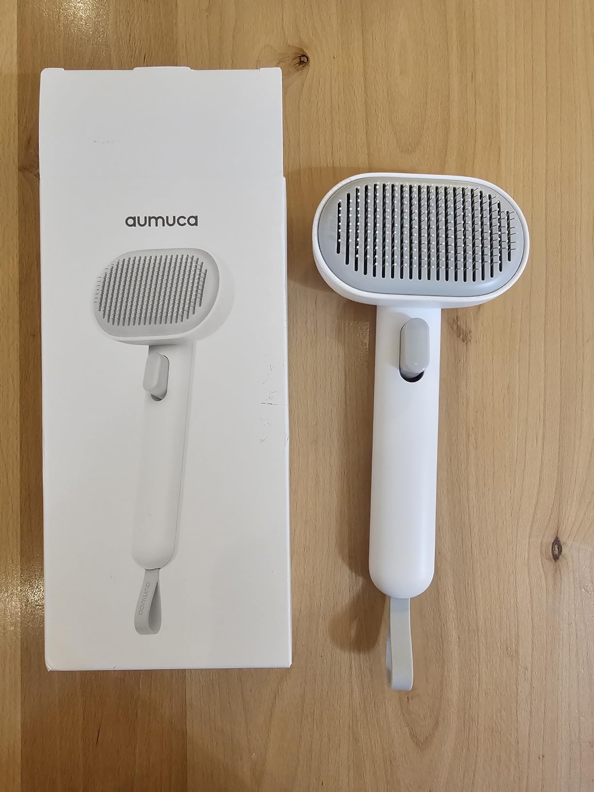 Aumuca Skin Friendly Self-Cleaning Slicker Brush for Dogs & Cats, Gentle Pet Grooming Tool for Shedding & Deshedding, Efficient Hair Remover for Long & Short Haired Pets customer photo 1