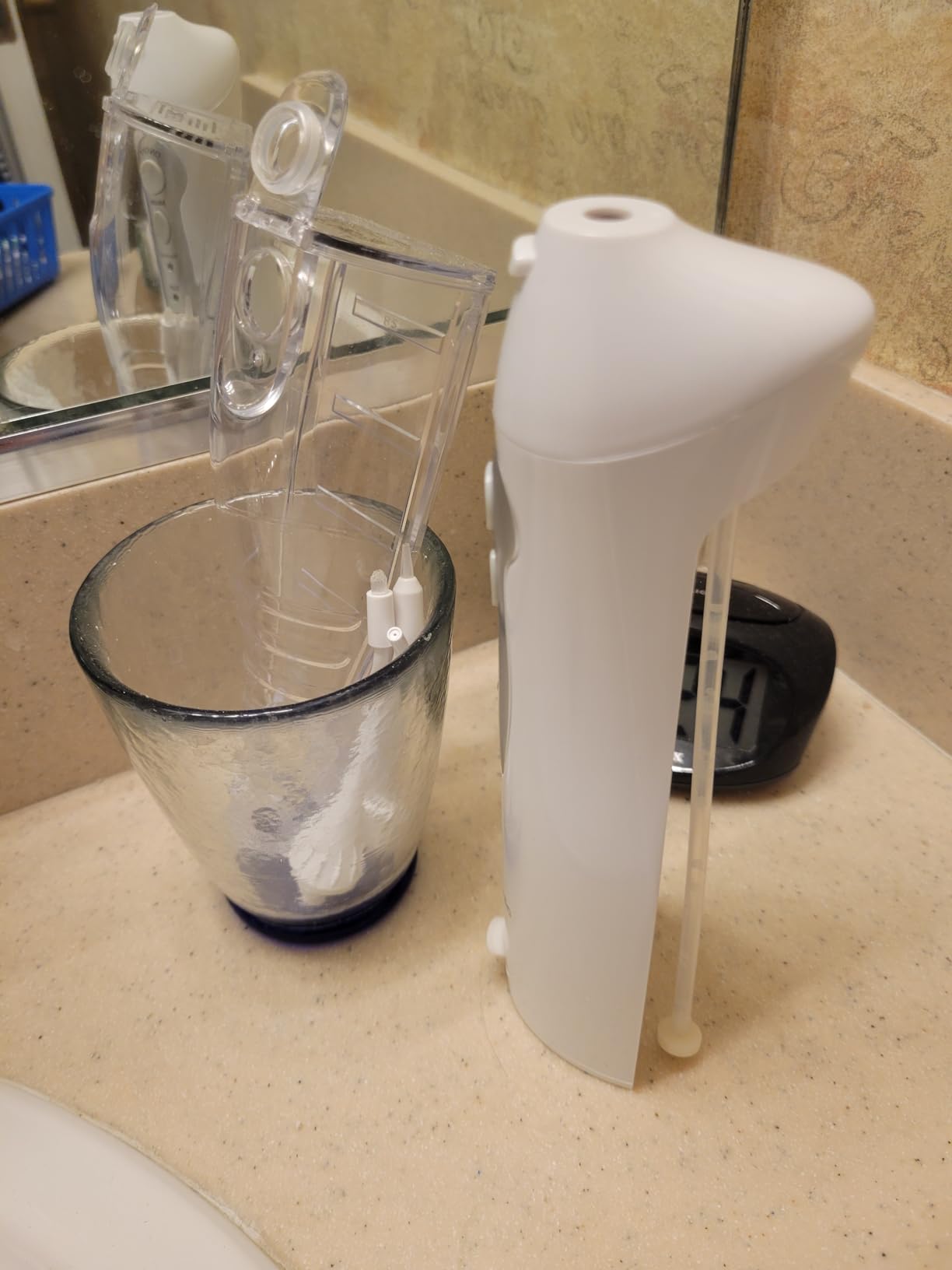 AquaSonic Water Flosser - Cordless Rechargeable Water Flossers for Teeth Cleaning - Waterproof Aqua Flosser, Portable Oral Irrigator for Dental Cleaning with 5 Jet Tips – Braces Home Travel customer photo 1