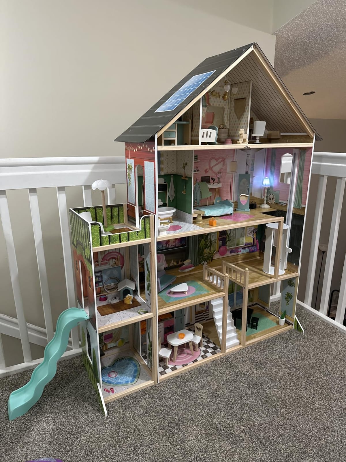 Delta Children Deluxe Maui Dollhouse - Large 4-Story Dollhouse with 12 Rooms Includes 50 Accessories - Working Elevator, Wave Slide, Lights/Sounds - Fits 12-inch Dolls - Pretend Play Gift for Ages 3+ customer photo 2