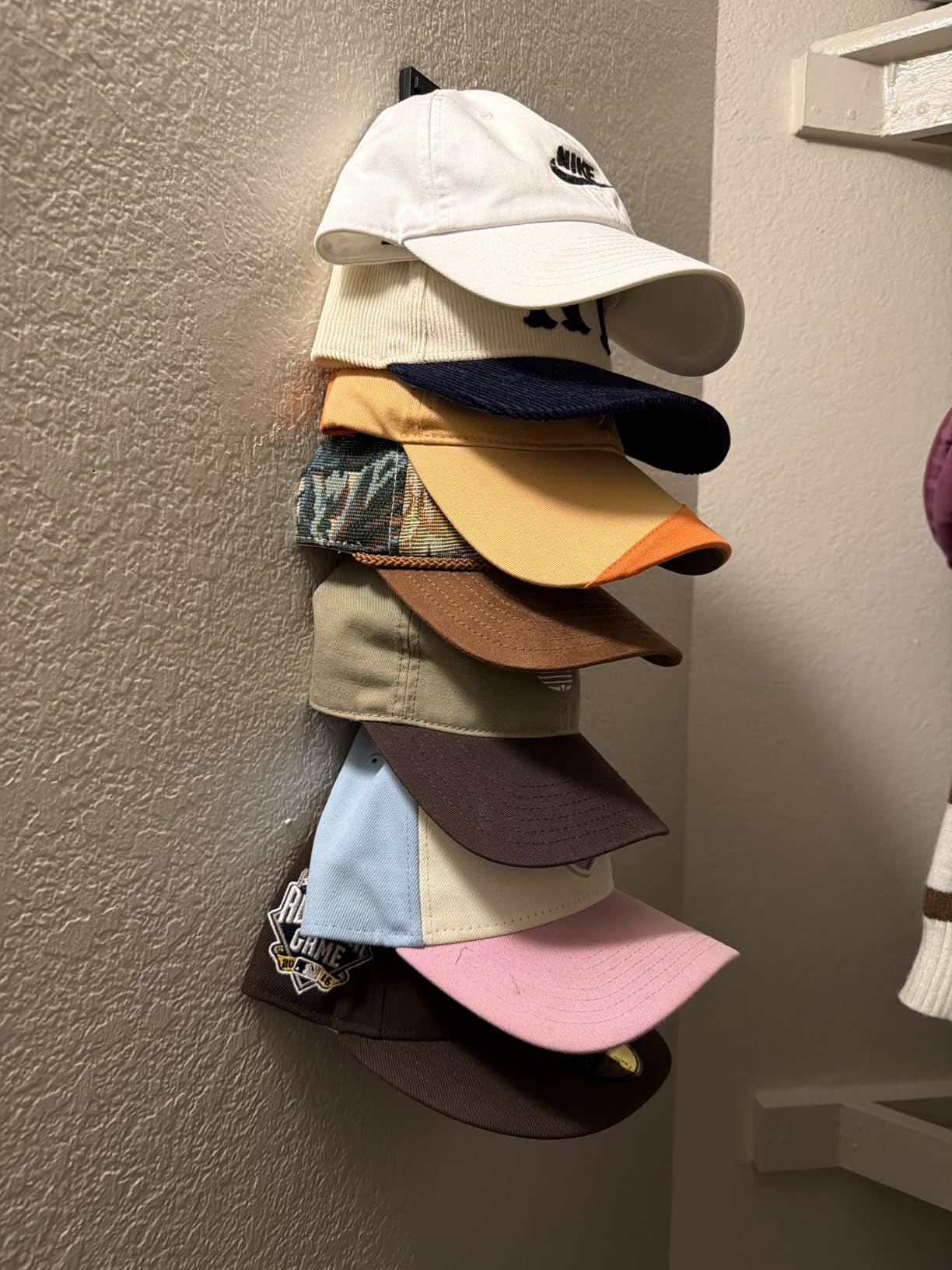 2 Pack Hat Organizer for Baseball Caps, Strong Adhesive Hat Rack for Wall, Multilayer Hat Storage Display Holder for Door Closet, Cap Organizer Storage Wall Mounted Hat Hooks Hold up to 18 Hat (Black) customer photo 1
