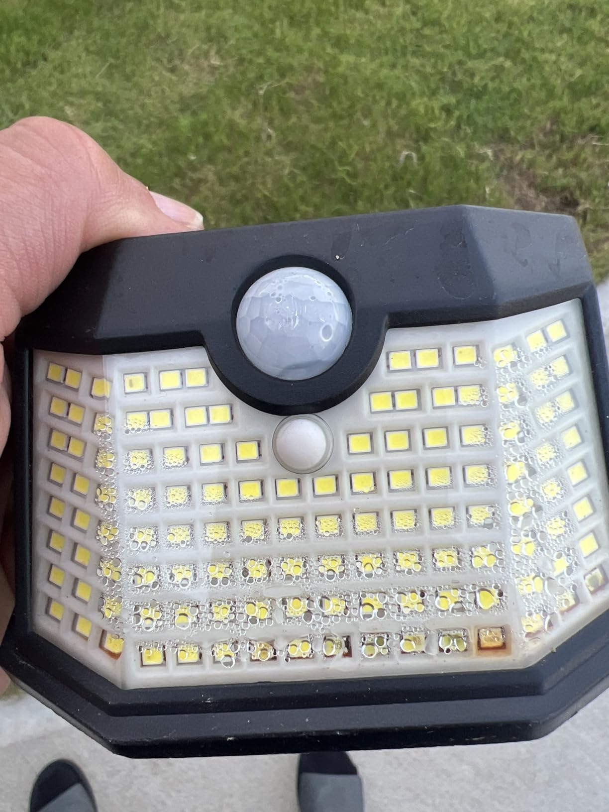 HMCITY 120 LED Outdoor Solar Lights with Motion Sensor and 3 Lighting Modes, IP65 Waterproof Wide Solar Wall Lights Ideal for Garden Patio Yard (Front Button 6Packs, Black Shell-Daylight White) customer photo 1