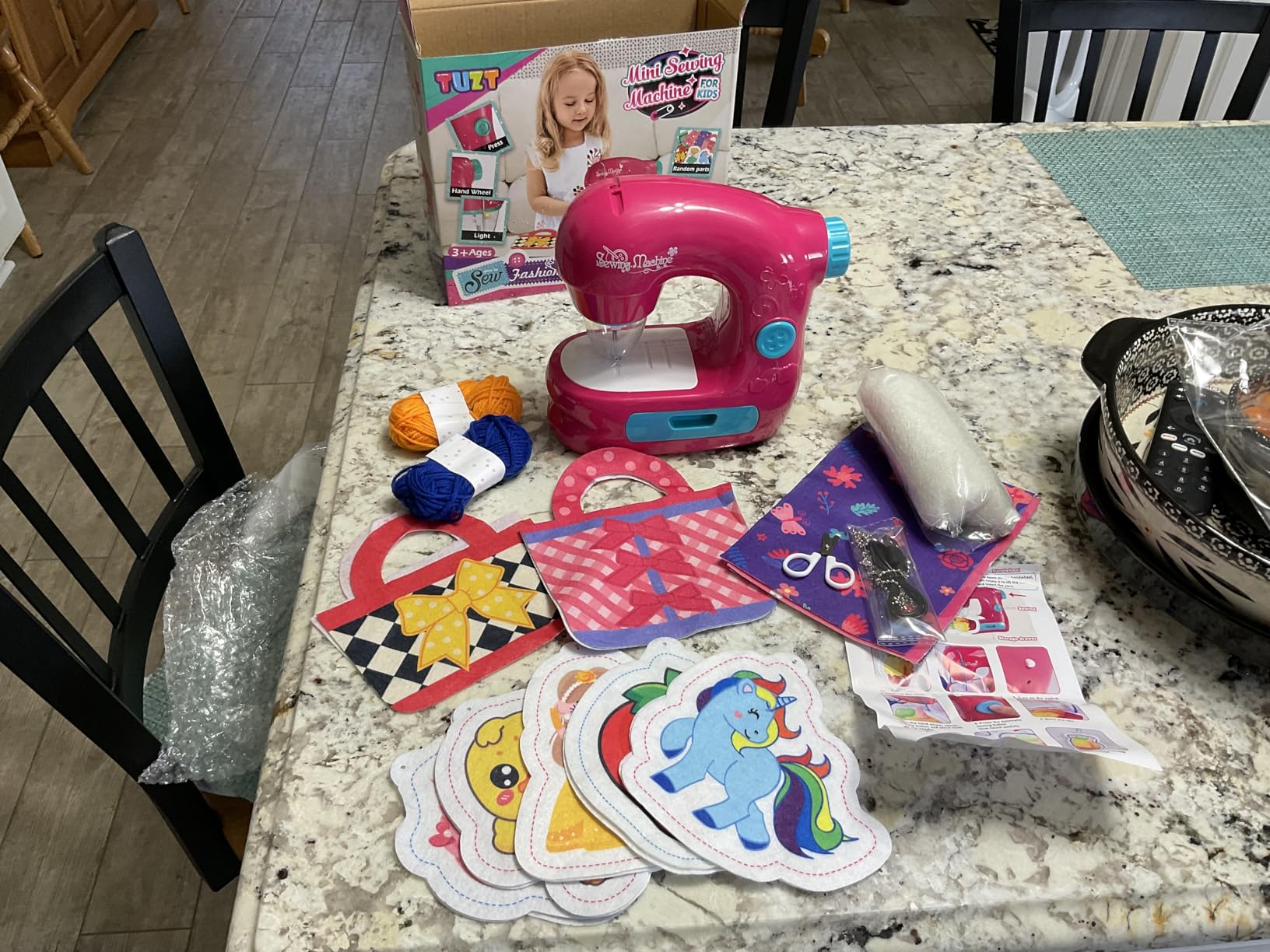 TUZT Mini Sewing Machine Toy Kit for Kids Beginners, 22pcs Portable Electric Sewing Machine with Sewing Kit, Light and Finger Guard, Birthday Christmas Gift for Kids Girls 4-12 customer photo 1