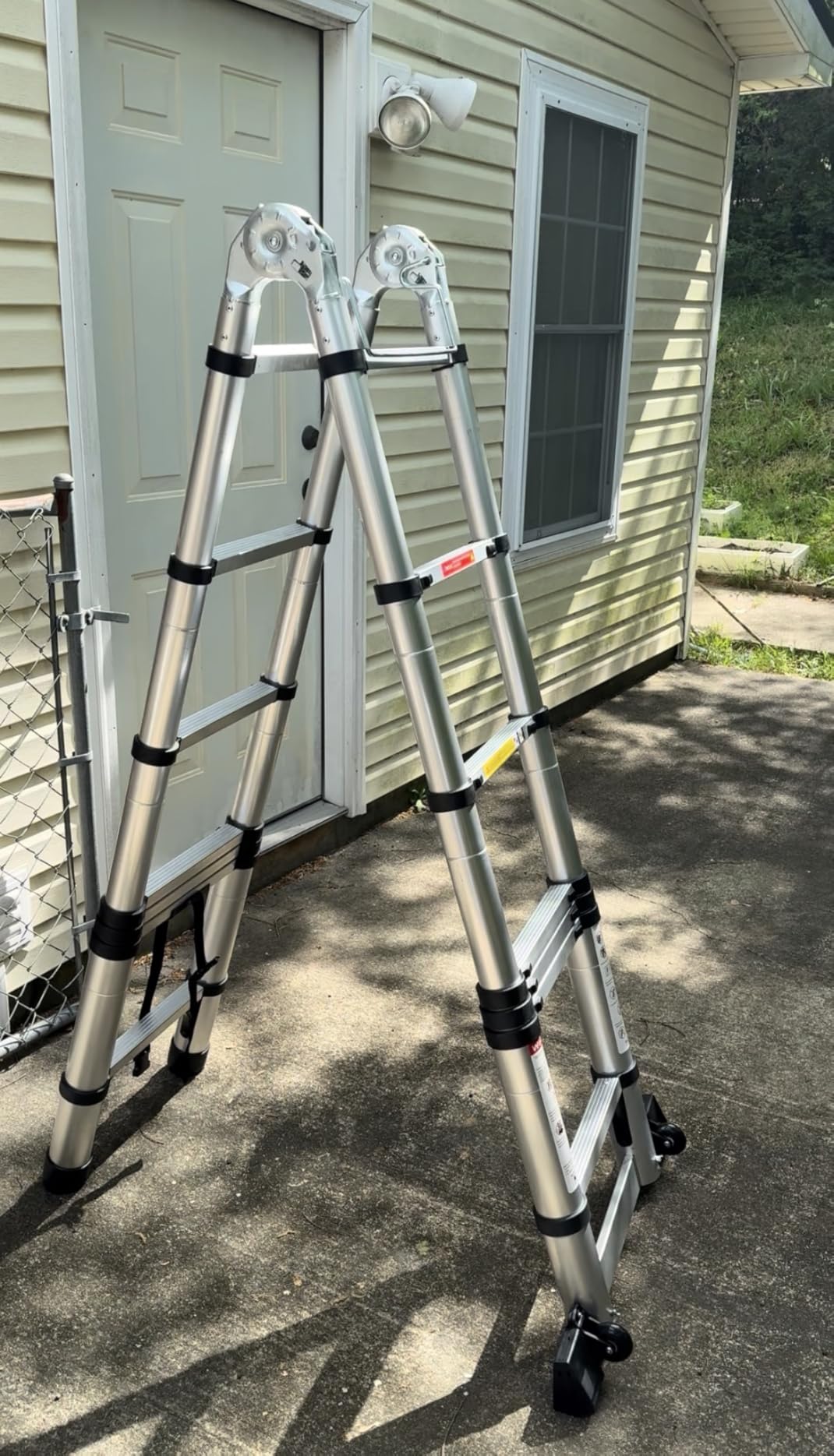 Telescoping Ladder with Hooks, 20.3 FT, Stabilizer & Wheels, Black | 300 lbs Capacity, Auto-Lock Rungs, Anti-Slip Feet; for Roof, Gutter, RV, Exterior Wall and Outdoor Maintenance customer photo 1
